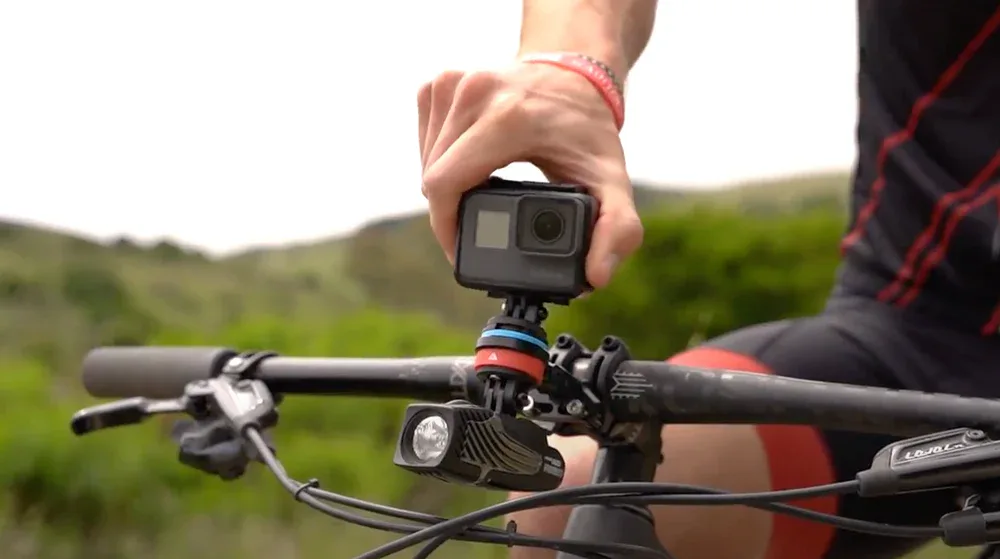action camera mounted on bicycle handlebars