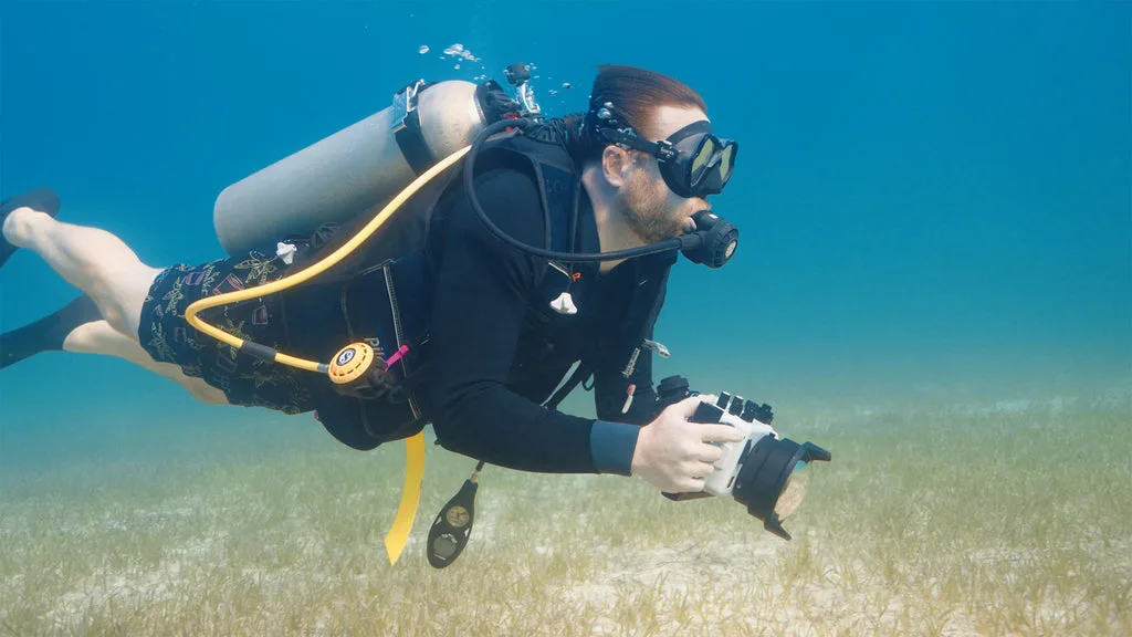 adjusting shutter speed underwater housing