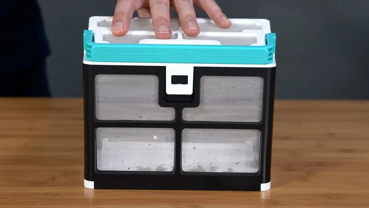 Aiper Seagull Pro filter basket debris close-up