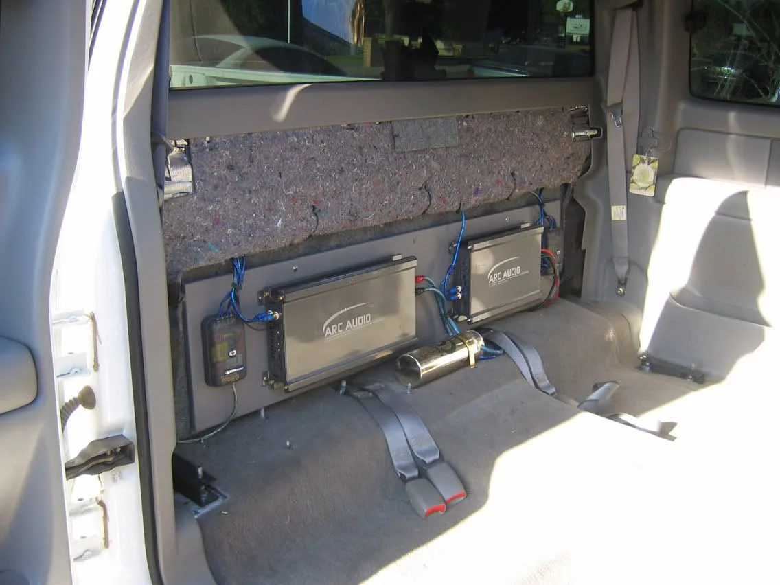 amplifier under passenger seat