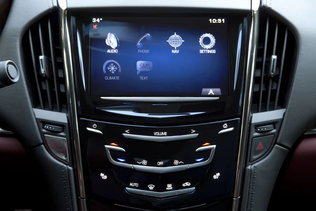 Cadillac CUE reset button combo