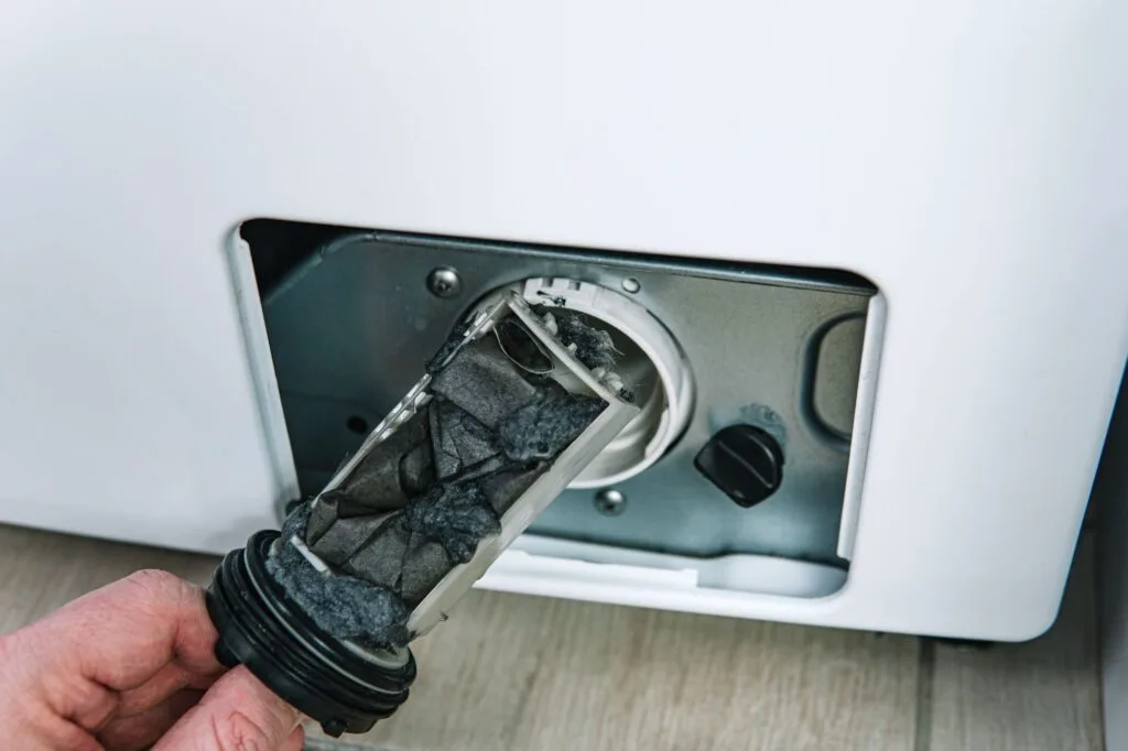 drain pump filter clogged with debris