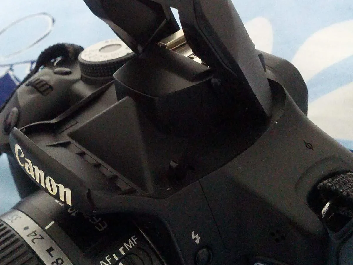 DSLR camera flash off button
