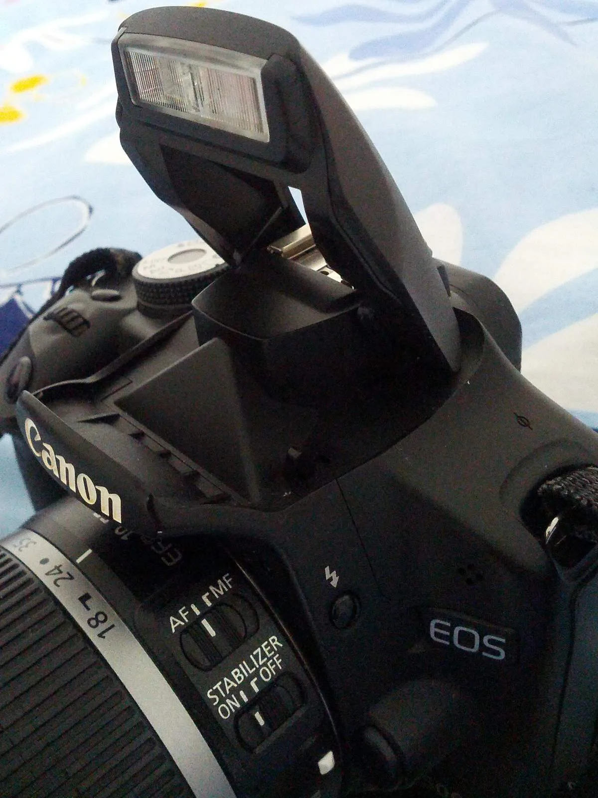 DSLR camera flash off button