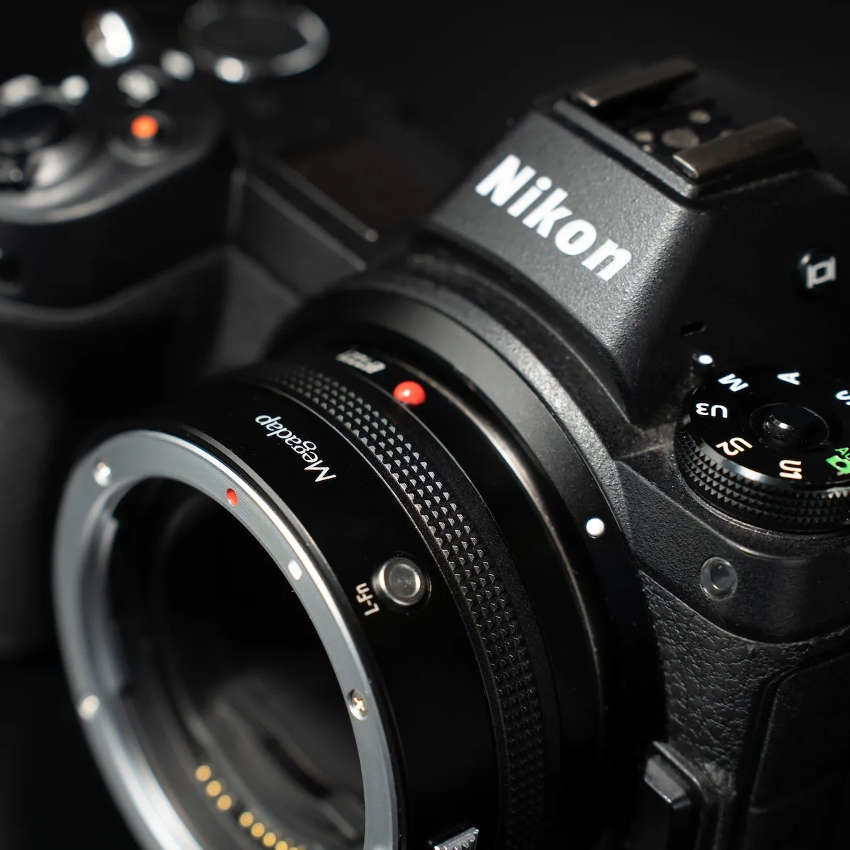 Focus mode switch on lens