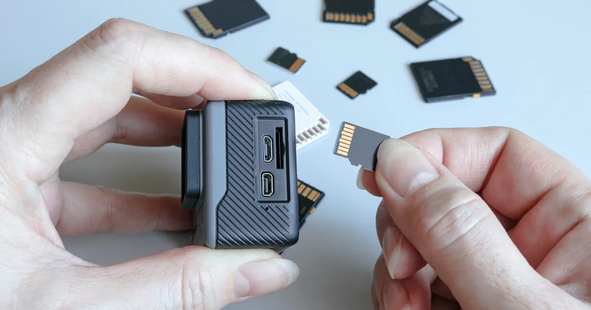 how to insert SD card into action camera