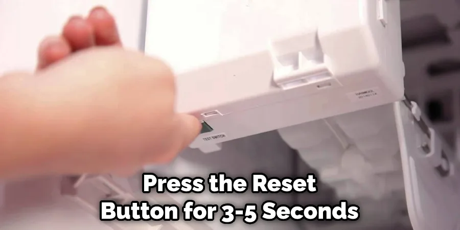 Ice maker reset button