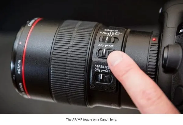 Lens focus mode switch