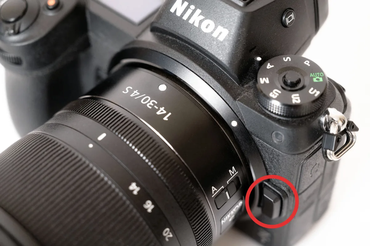 Lens release button