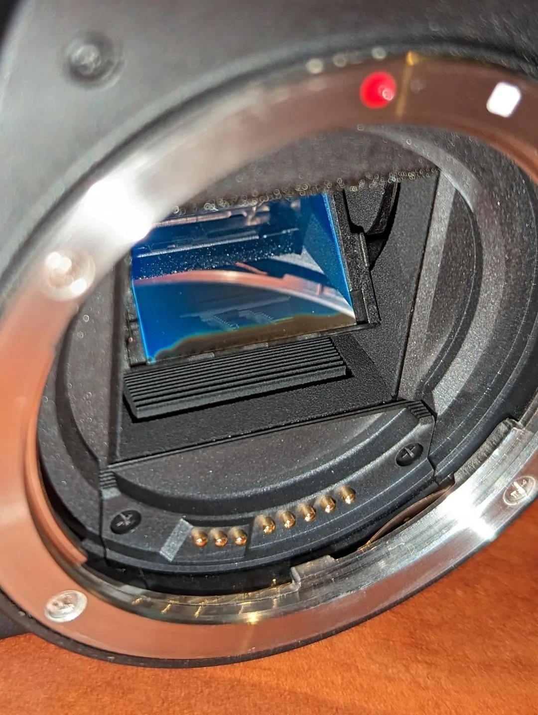 Mirror bounce dampening (foam or rubber stop)