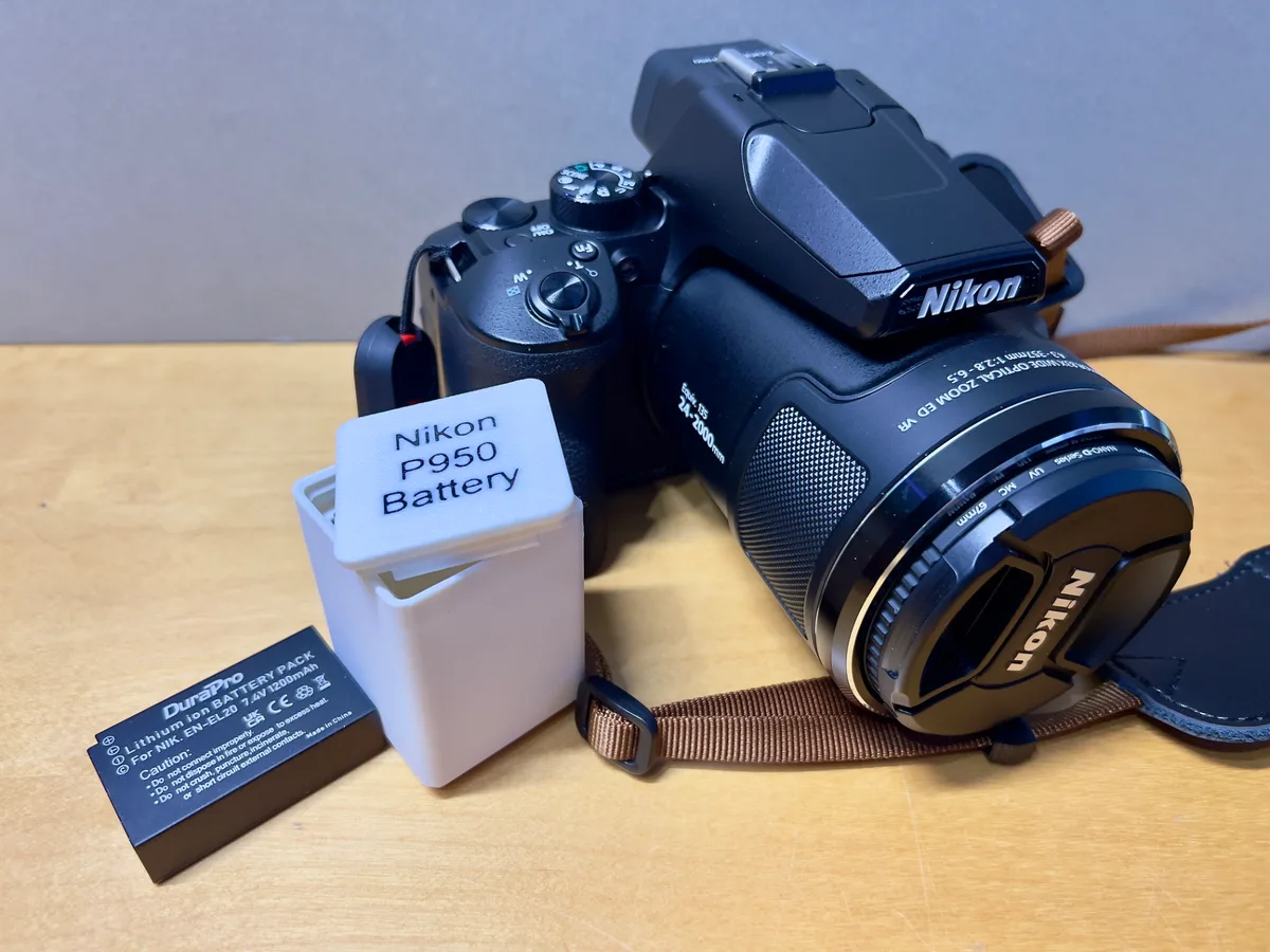 Nikon P950 battery door latch