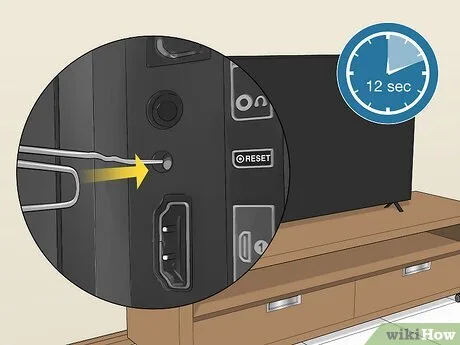 Onn TV pinhole reset button