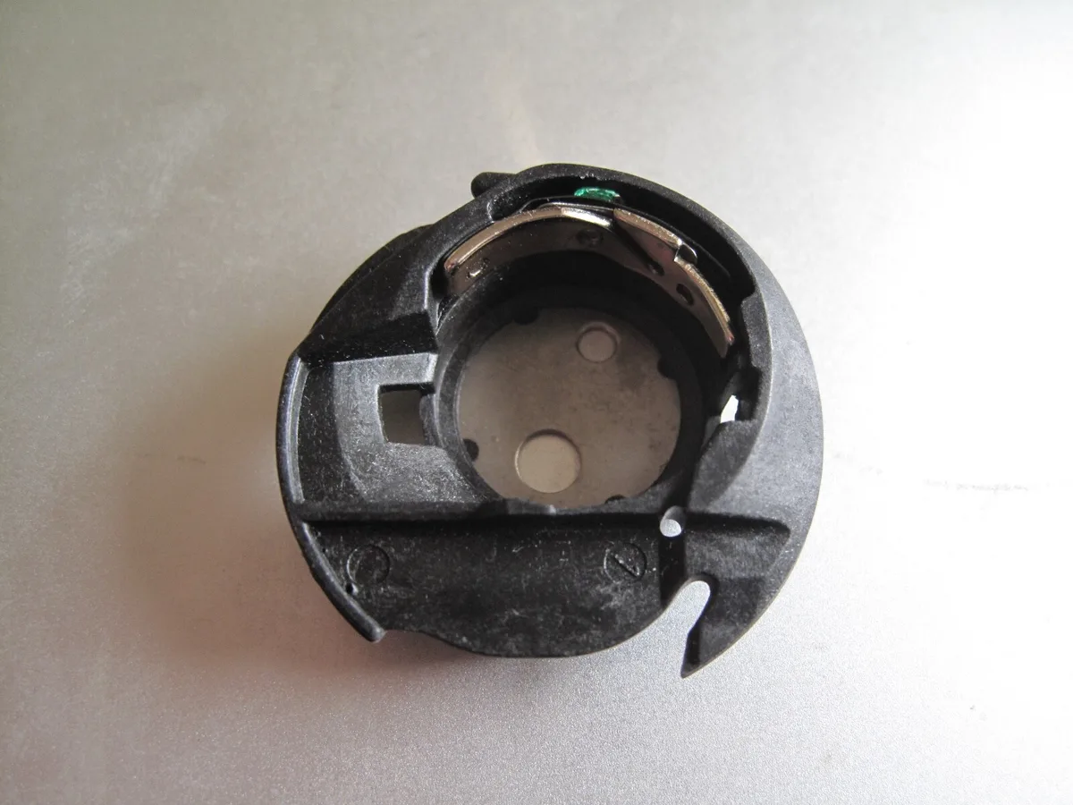 Plastic bobbin case ring