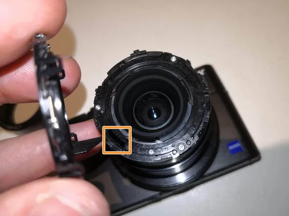 Pop-up flash mechanism (physical latch, motor, spring)