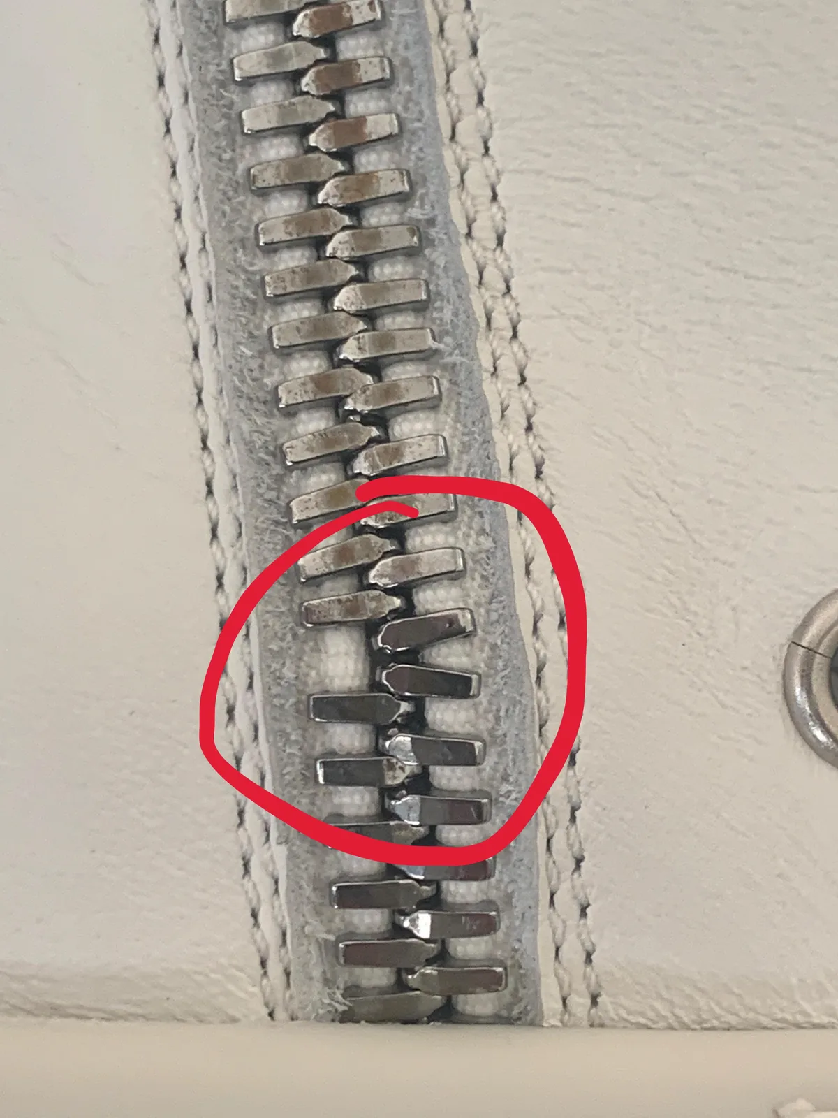 separated zipper teeth
