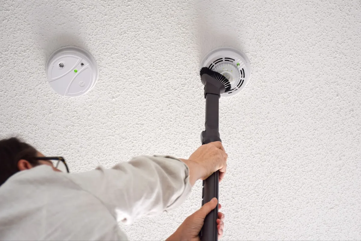 smoke detector sensor cleaning closeup